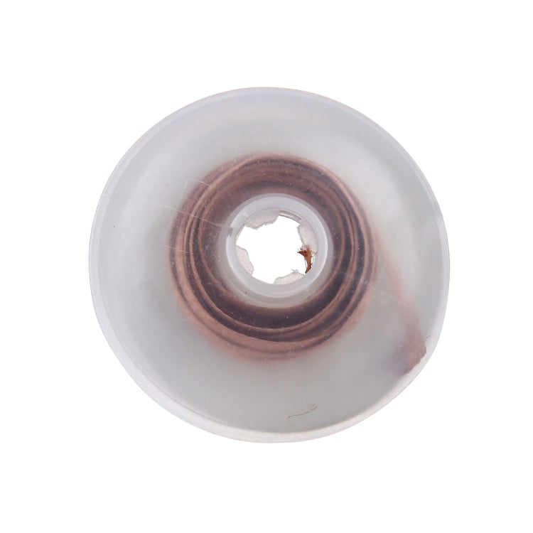Tin absorption solder wick spool with copper-colored wire wound in a circular coil
