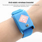 Blue wireless anti-static wrist strap worn on arm with blue discharge module