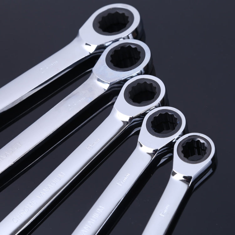 Close-up of chrome ratchet wrenches with black socket openings, set of 5