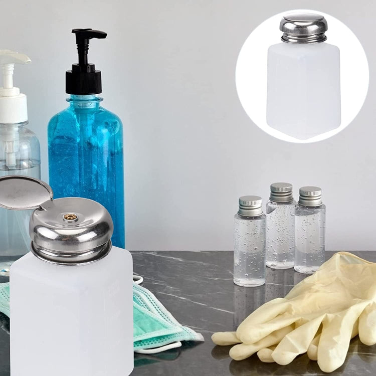 White translucent alcohol dispenser bottle with silver push-down flip-top cap