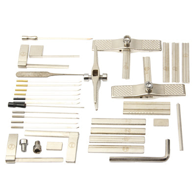 Foil tools set with metal cutting and pressing attachments, rods, clips, and gauges