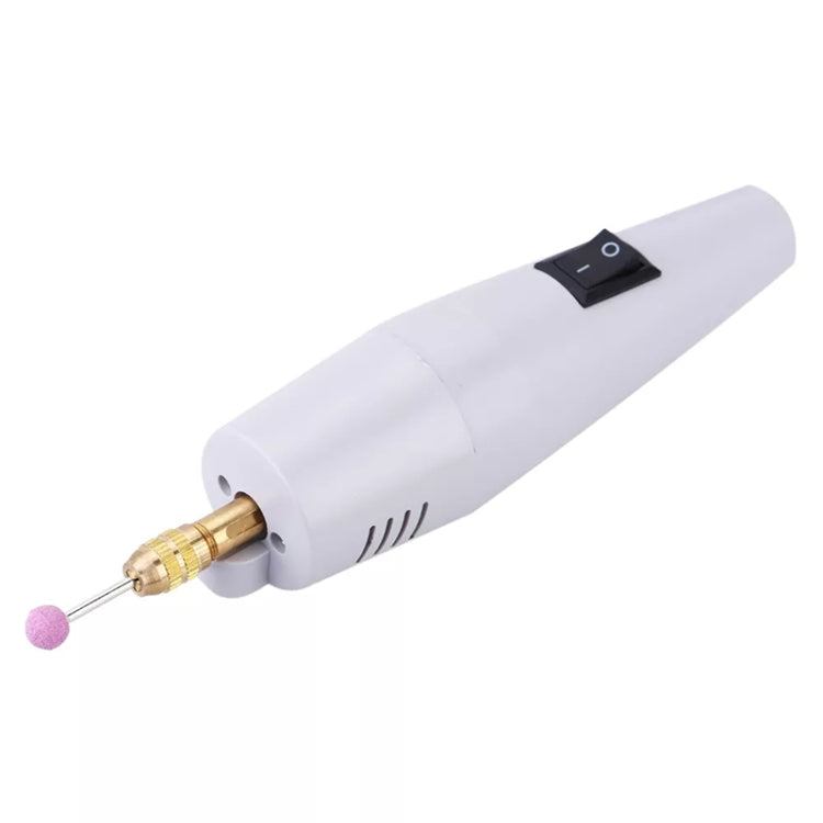 White super mini electric drill with brass chuck, switch, and pink sanding tip