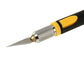 Carving knife blade detail with textured metal grip and yellow collar