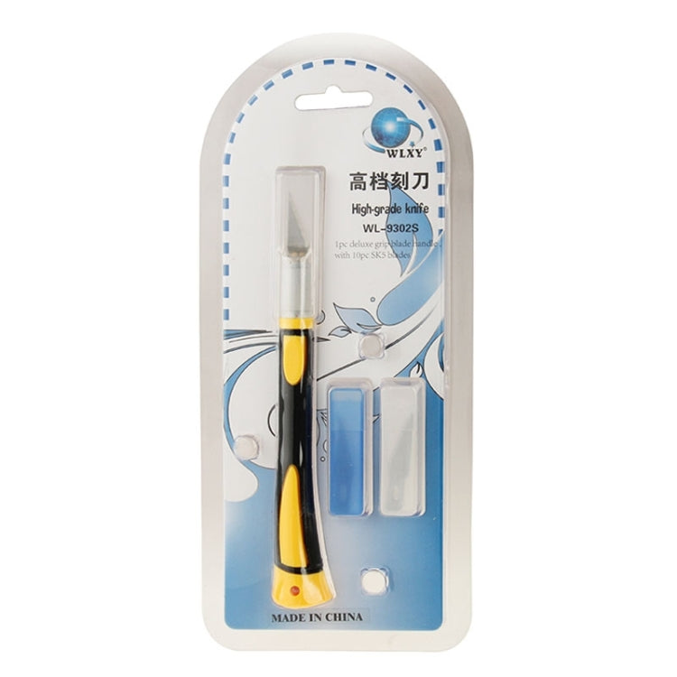 Carving knife blister package with black-and-yellow handle and spare blades