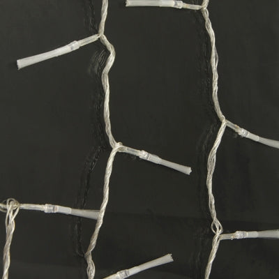 Clear-wire LED string lights close-up with small white bulb housings