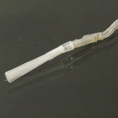Single LED on clear wire string light with small white bulb capsule