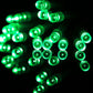 Green LED string lights with round bulbs on clear wire, bright glow visible