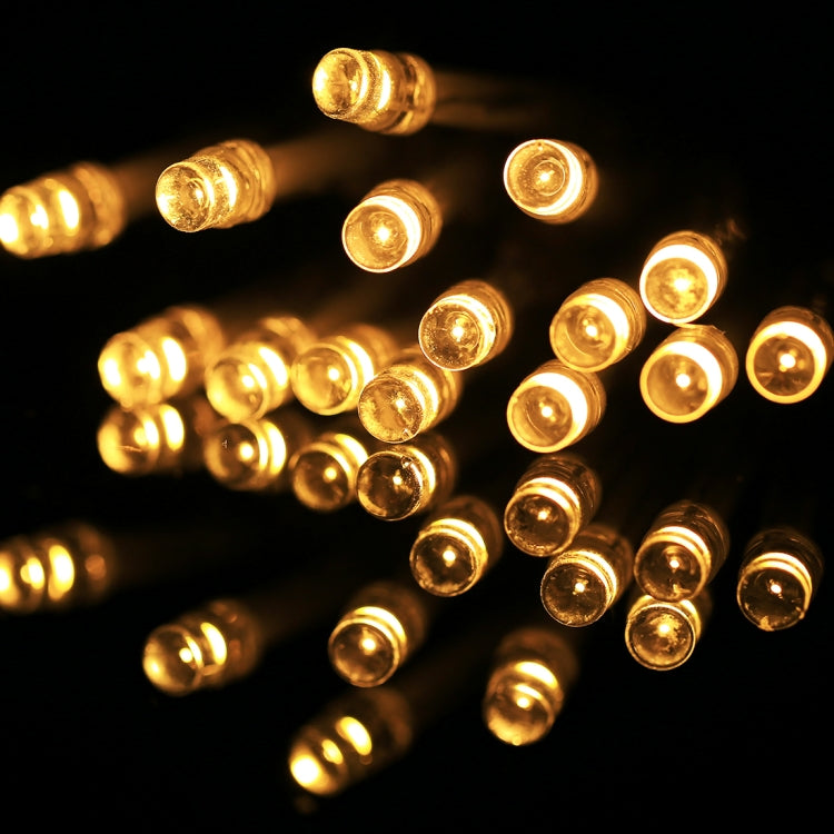 Warm white LED string lights with round gold-tinted bulbs, glowing