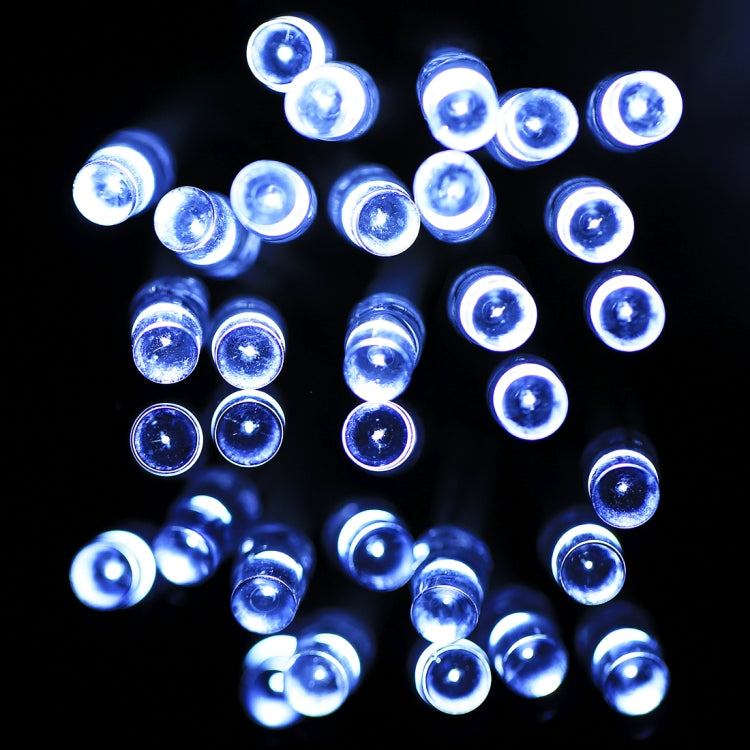 Cool white LED string lights with round bulbs, bright blue glow