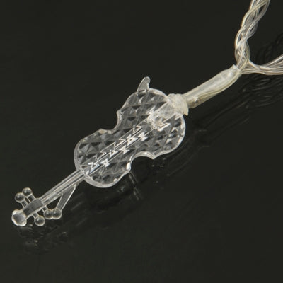 Close-up of clear LED bulb on 30-LED light string with twisted wire leads