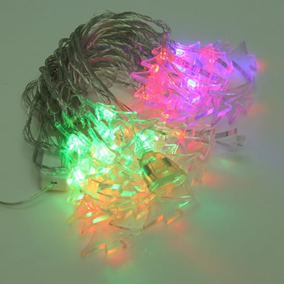 Multi-colored LED light string glowing with clear star-shaped clips on wire