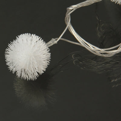 30-LED multi-colored string light with one white pom-pom bulb and clear connecting wire.