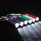 Multi-color carabiner keychain buckles, close-up row of cylindrical shells