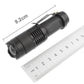 Black zoom LED flashlight with ridged grip; size marked 9.2 cm