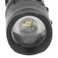 Close-up of black flashlight lens with visible LED chip