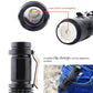 Black clip-style LED flashlight showing front lens and side body