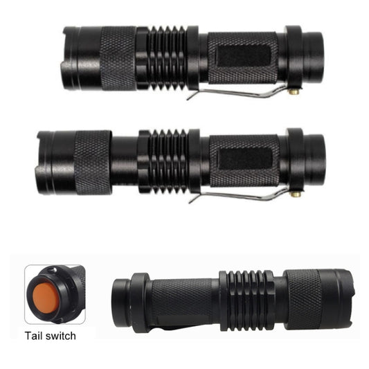 Black LED flashlight with textured body, front lens, and tail switch detail