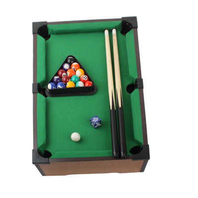 Miniature pool table interior with green felt, clustered balls, and three cue sticks