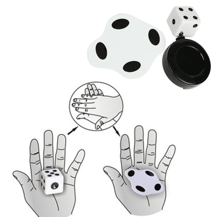 Three-piece flat magic trick toy with white die, black base, and hand diagram