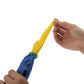 Hand holding color-changing linked silk toy; yellow and blue linked ends with green knot