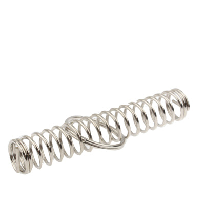 Metal coiled spring trick toy with attached ring, angled close-up