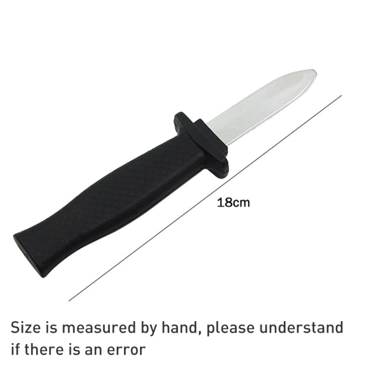 Retractable plastic gag knife with black handle and extended blade; measures 18cm