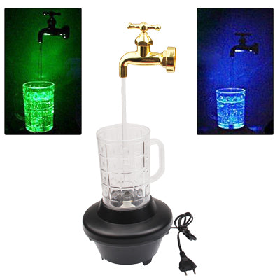 Electric water mug with clear cup, black base, and gold faucet spout