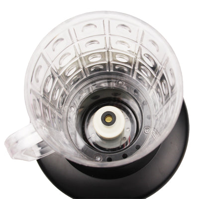 Clear plastic mug reservoir with central power nozzle on black base