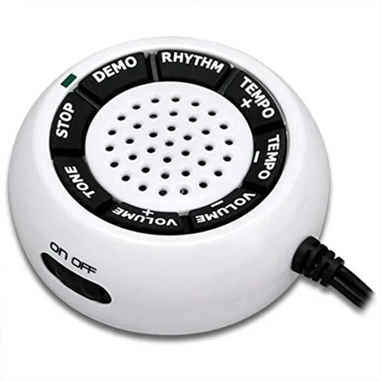 Electronic piano glove speaker control, round white device with rhythm and tempo buttons