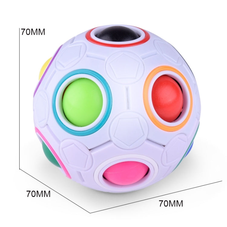 White magic ball puzzle cube with neon green, orange, and pink ringed openings