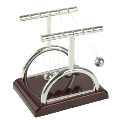 Mini Newton's cradle with maroon base, chrome frame, and hanging steel balls