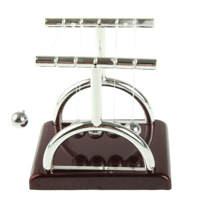 Newton's cradle balance stand with maroon base, chrome arch, and hanging steel balls