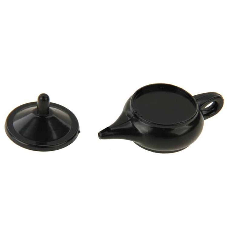 Black teapot magic prop with lid knob and side handle, small matching piece included