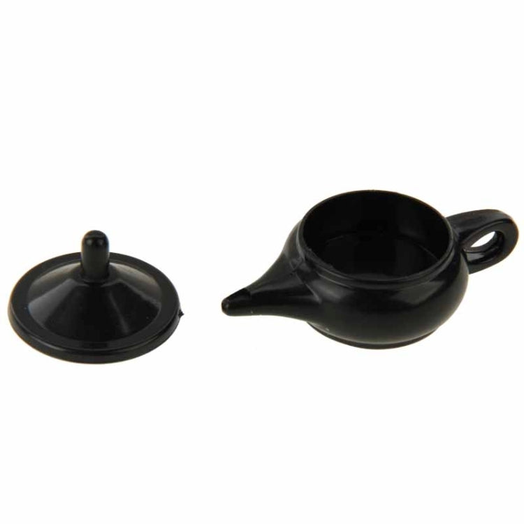 Black teapot magic prop with lid knob, shown with matching base piece