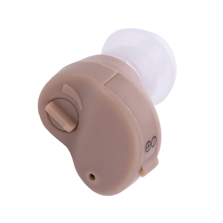 Beige in-ear canal hearing aid with clear ear tip, K-80, front view