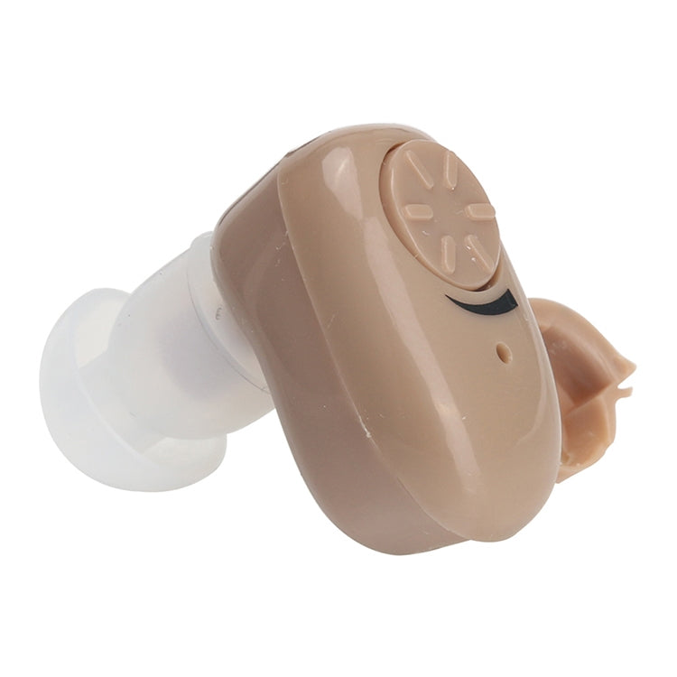 Wireless hearing aid with beige casing and white ear tip, angled close-up