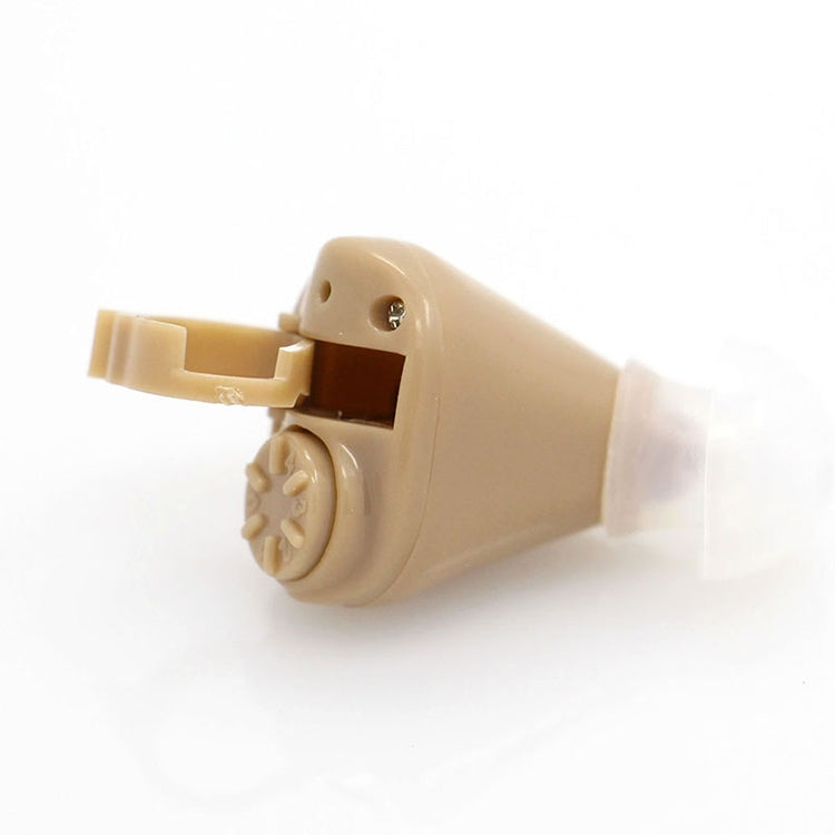 Beige wireless hearing aid showing side controls and listening ear piece