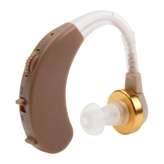 Brown behind-ear hearing aid with clear ear tube and gold-tone control panel