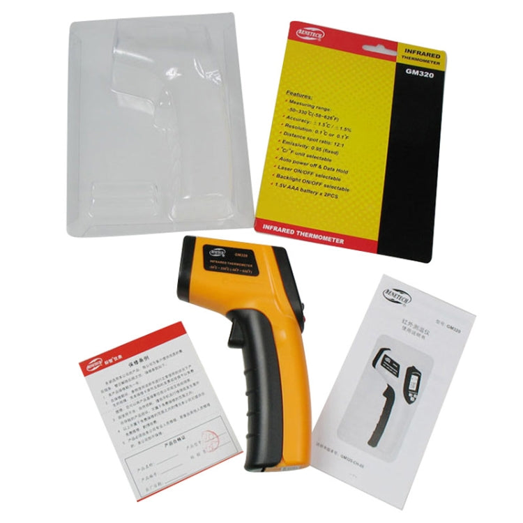 Orange and black infrared thermometer kit with instruction sheets, manual, and clear cover