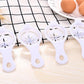 Egg separator tools, multiple white scoop handles with vented disc inserts