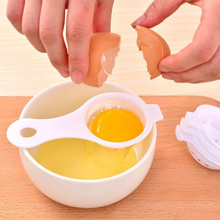 Egg separator, white scoop tray with yolk while separating eggs