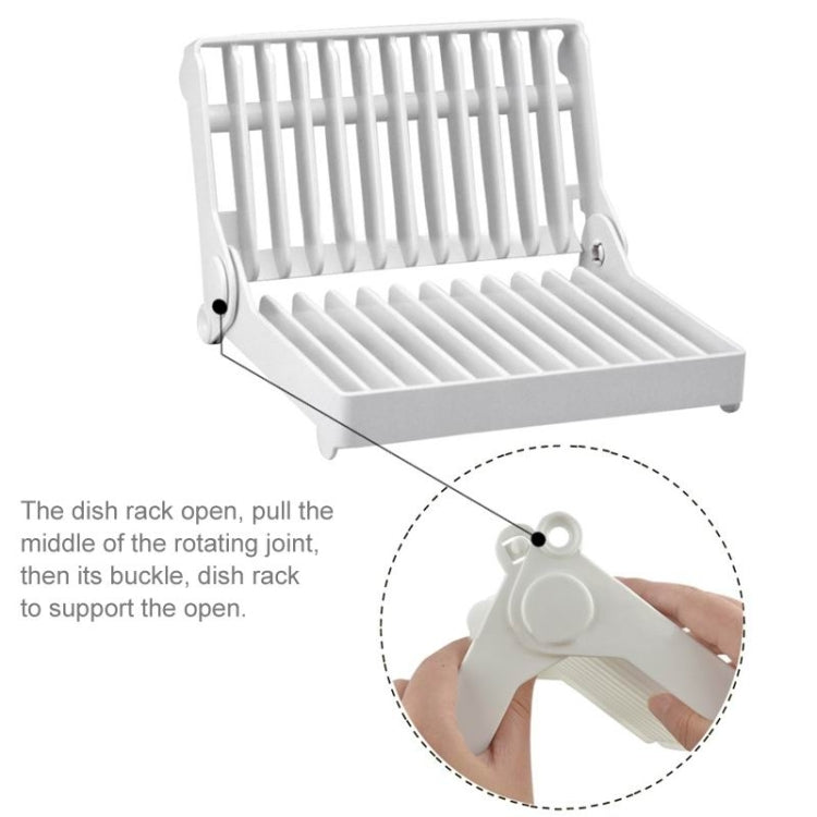 White foldable dish rack with open base and vertical slat panel held in place