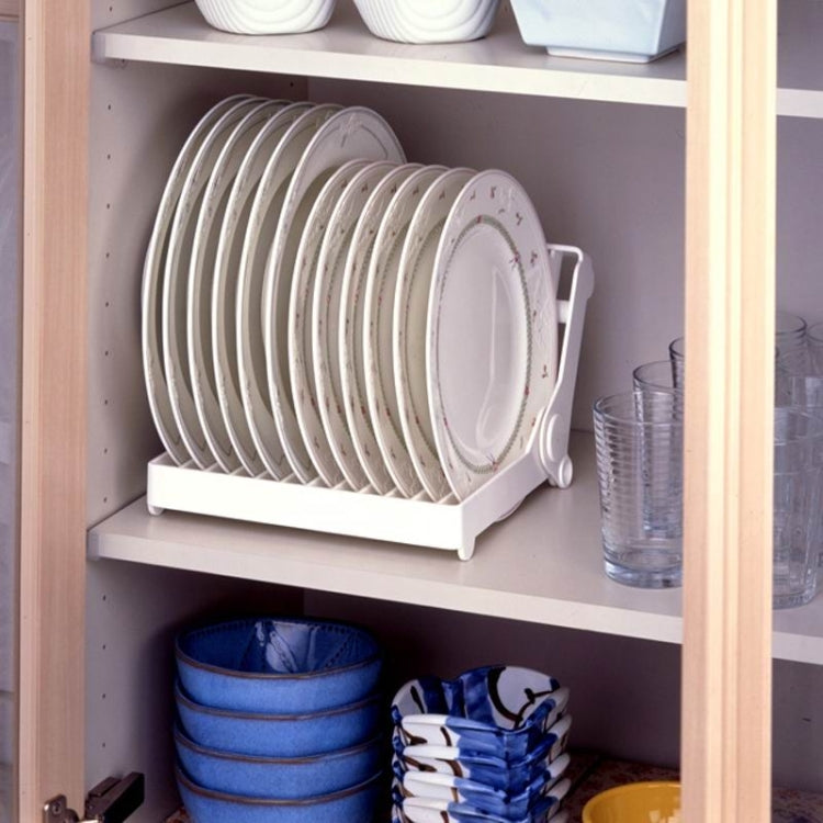White plate drip rack installed in a cabinet, holding a vertical stack of plates