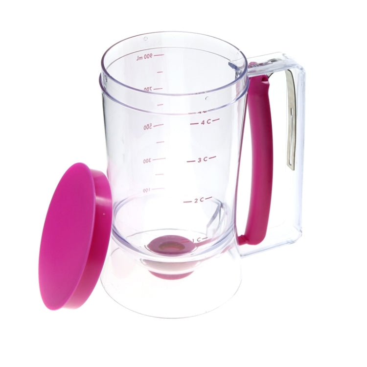 Clear batter dispenser cup with pink handle, lid, and red cup measurement lines