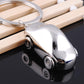 Polished chrome car-shaped metal key chain with key ring and wheel details