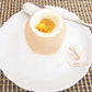 Boiled egg shell cutter tool showing a hard-boiled egg cut in halves