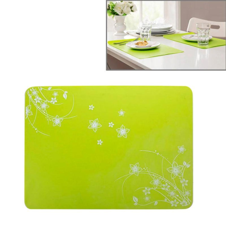 Green silicone heat-insulation mat with white floral design, 40x30 cm