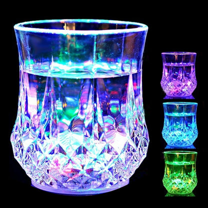 Color-changing LED light cup with faceted pattern, glowing rainbow colors