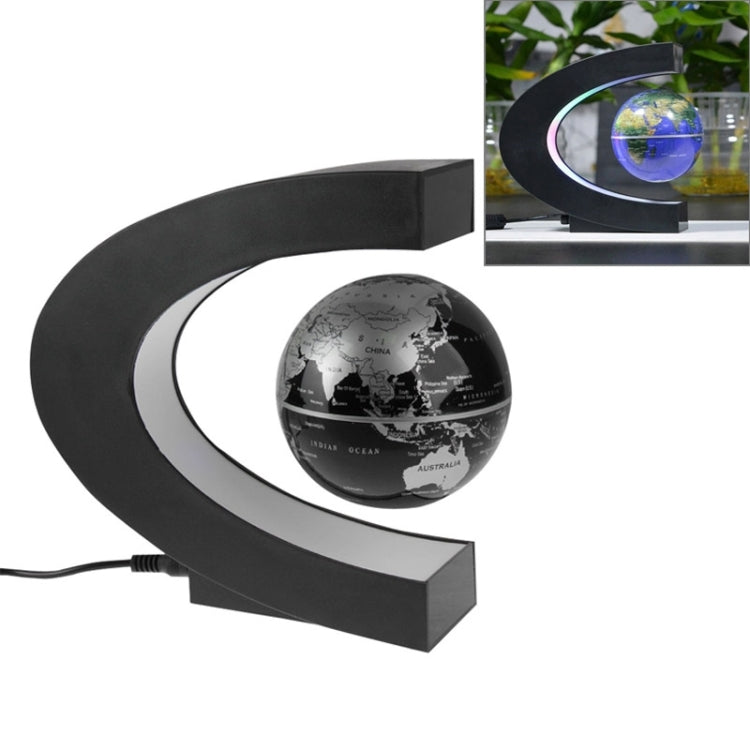 Black magnetic floating globe stand with globe and multicolor LED ring