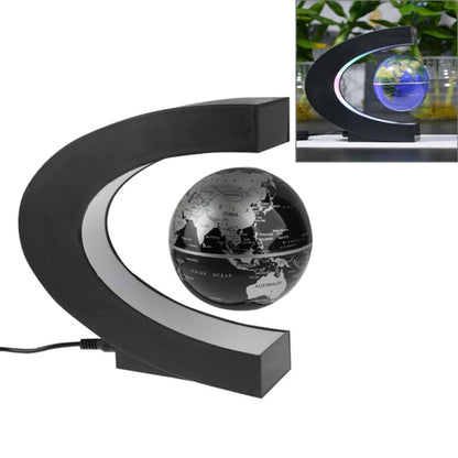 Black magnetic floating globe stand with globe and multicolor LED ring